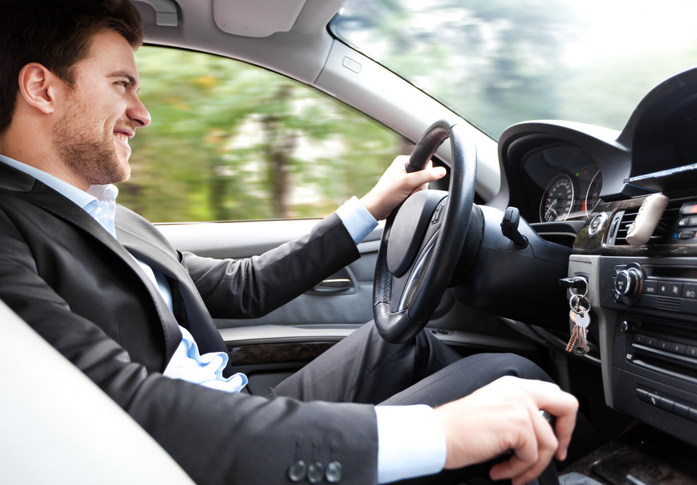 Man,Driving,His,Car
