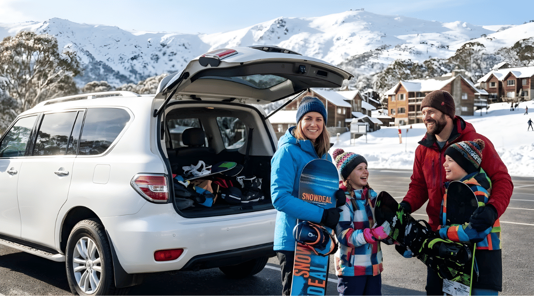 A pristine, white family SUV parked perfectly on a smooth, cleared and sealed asphalt surface near a beautiful snowy Australian alpine resort.